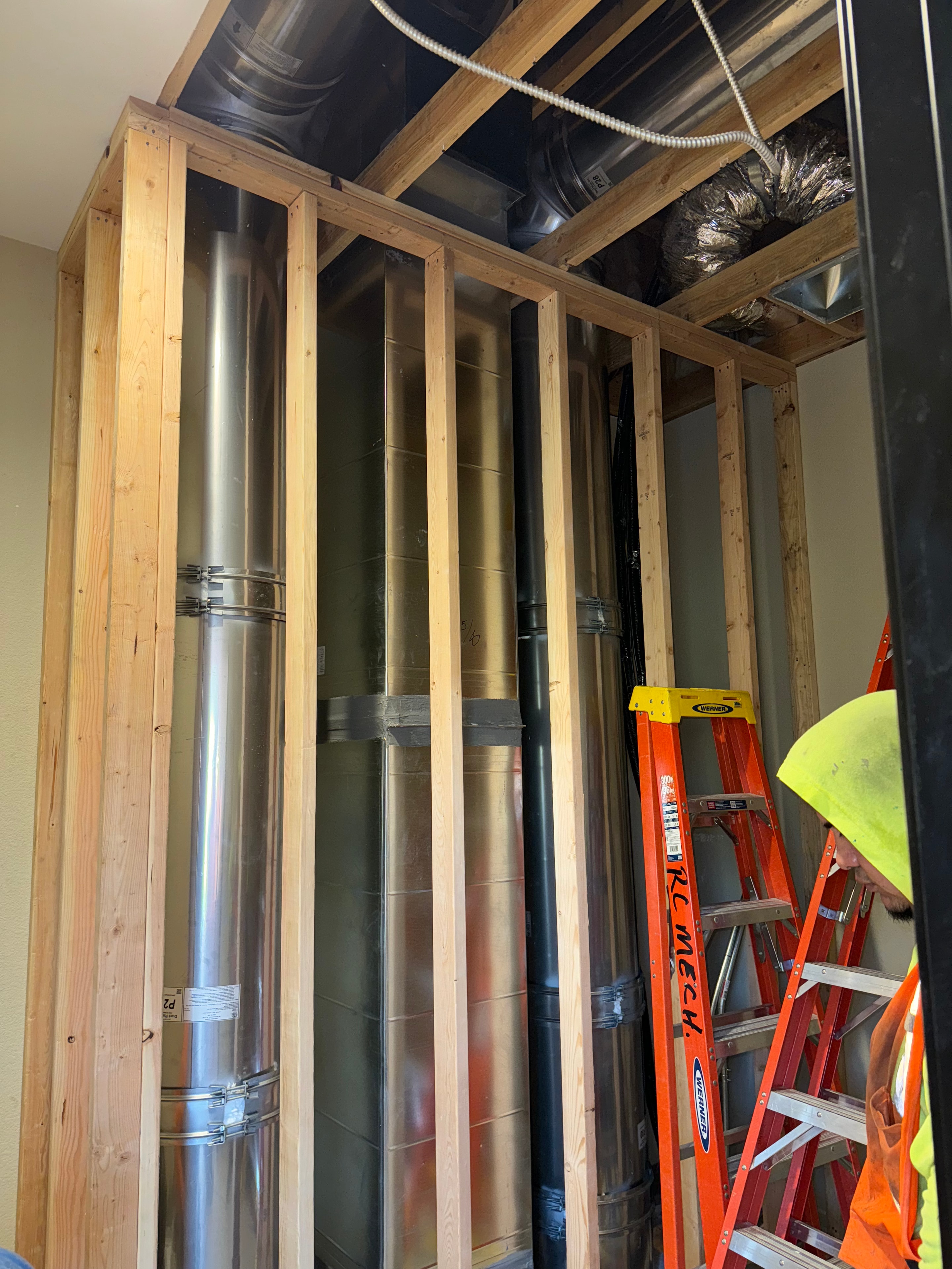 Grease duct chase — second angle with crew