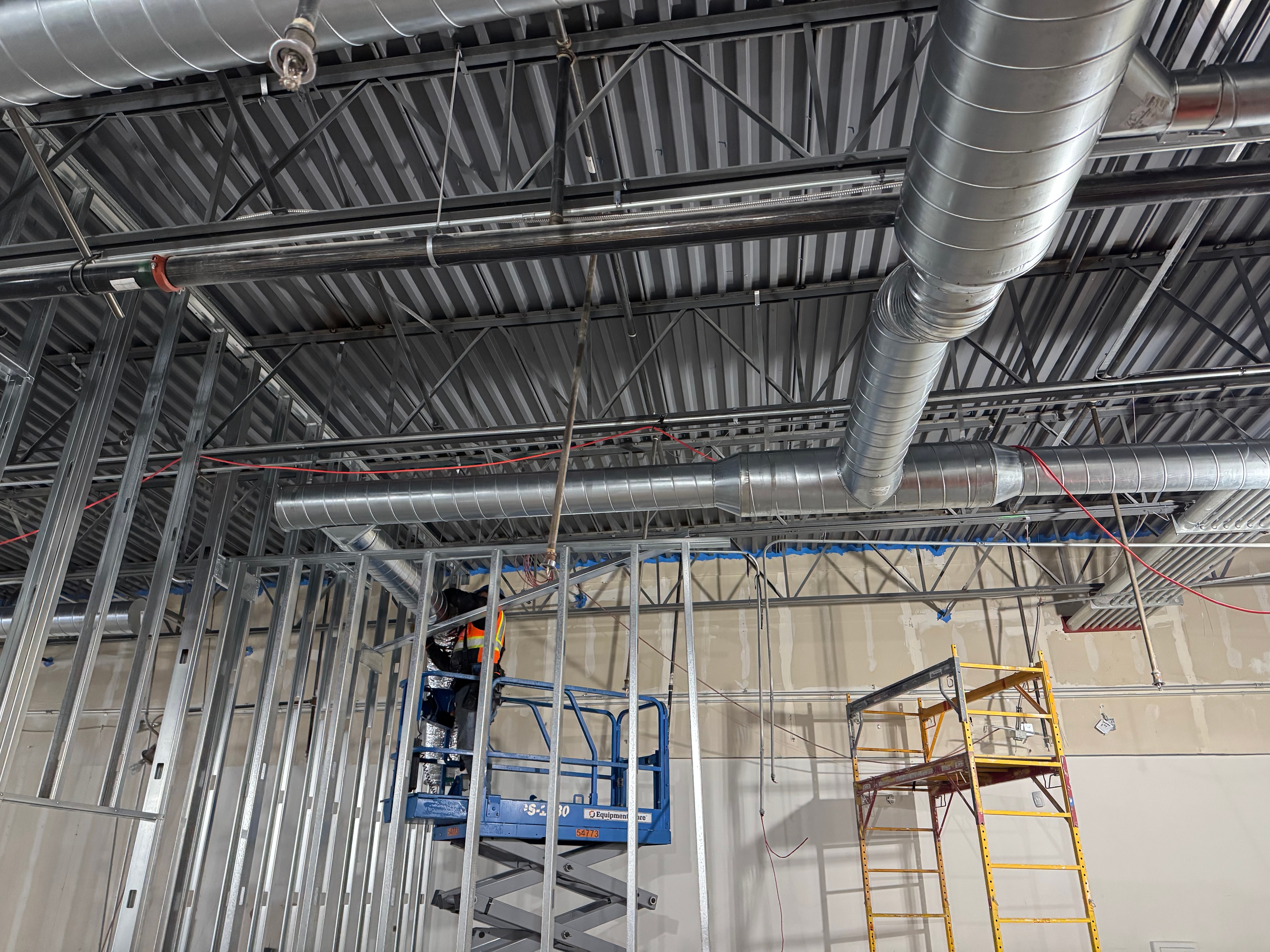 Finished ceiling coordination — full floor