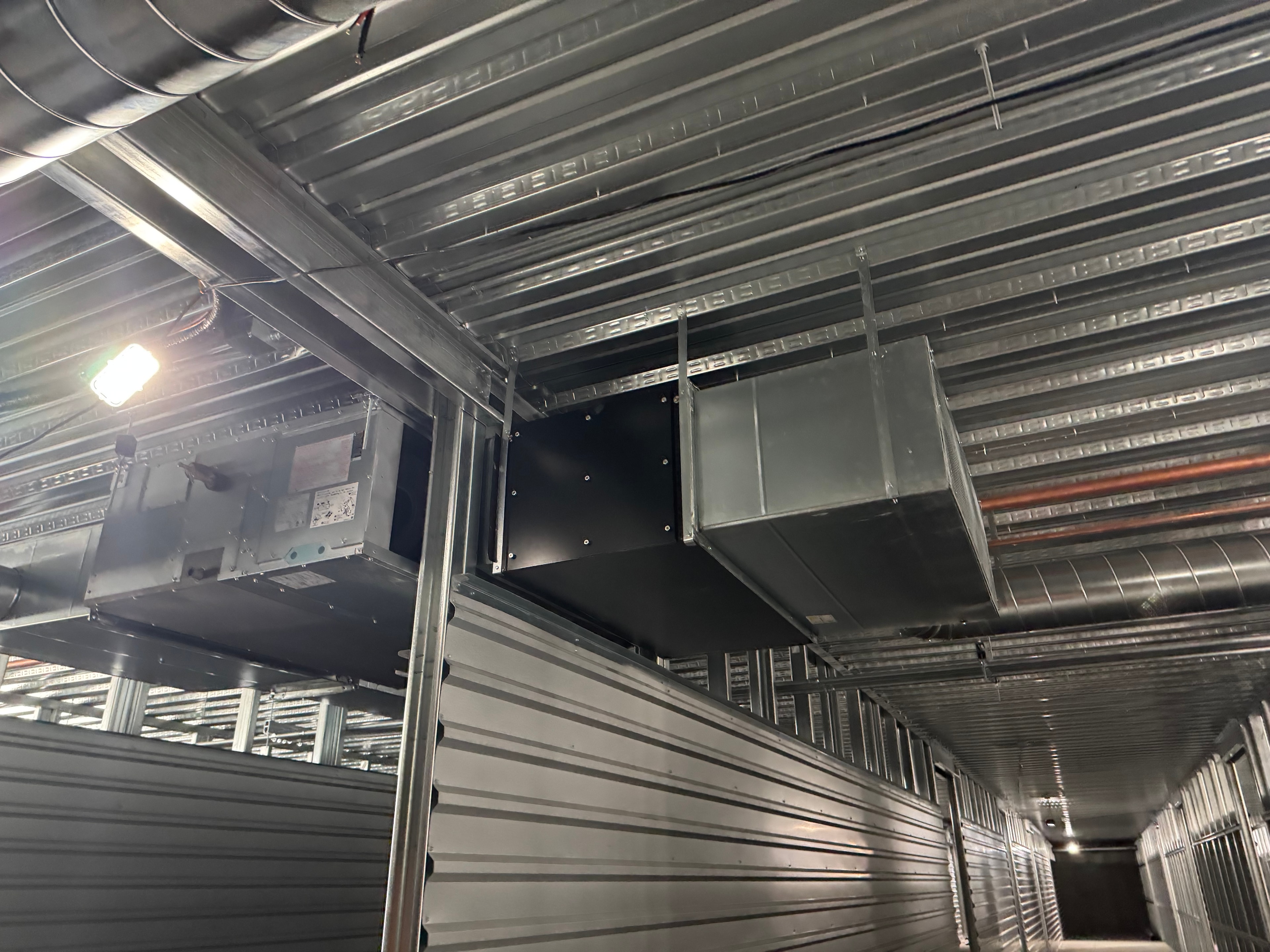 Suspended fan coil units with rectangular plenum
