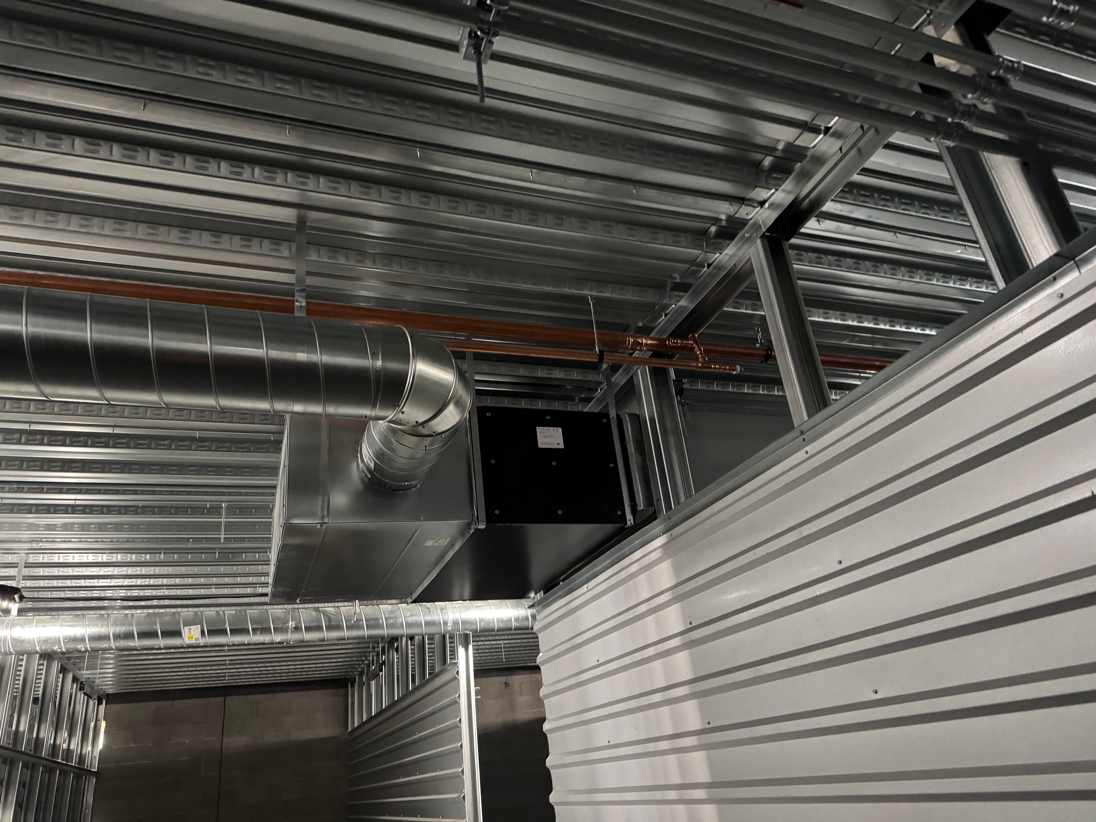 Round trunk with rectangular transition and fan coil